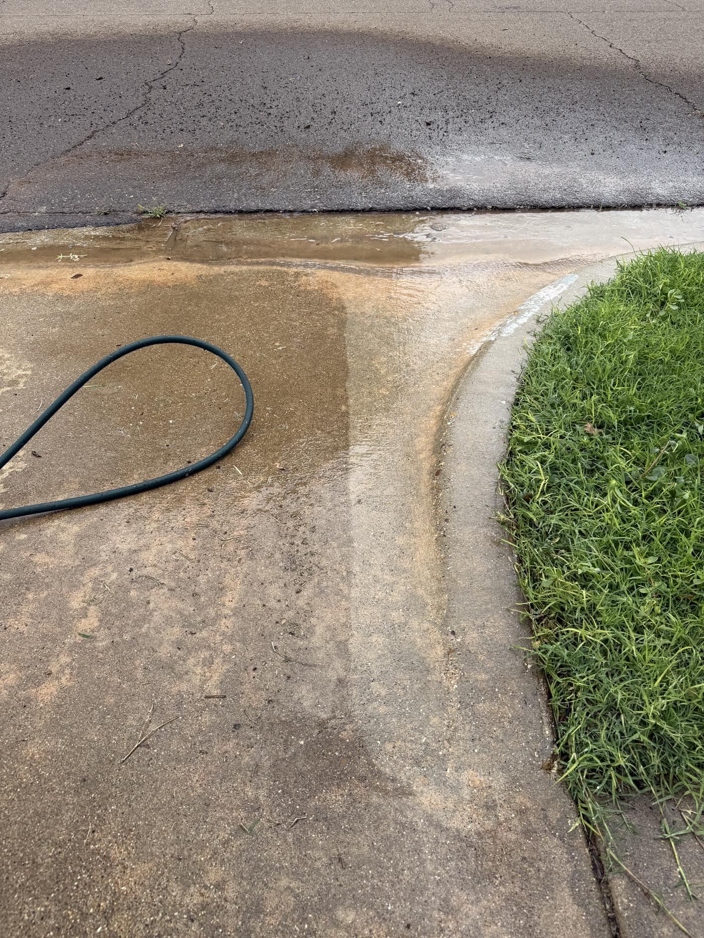 Pressure washing before and after — Lubbock driveway